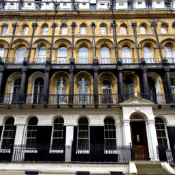 the elegance of Chancery Quarters on Chancery Lane through an image that showcases the grandeur of its Georgian architecture, with ornate wrought-iron balconies, tall sash windows, and a striking entrance adorned with intricate carvings